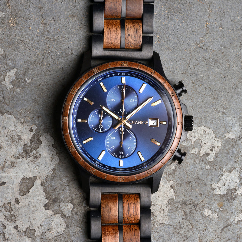 Wristwatch with wooden strap on a textured surface