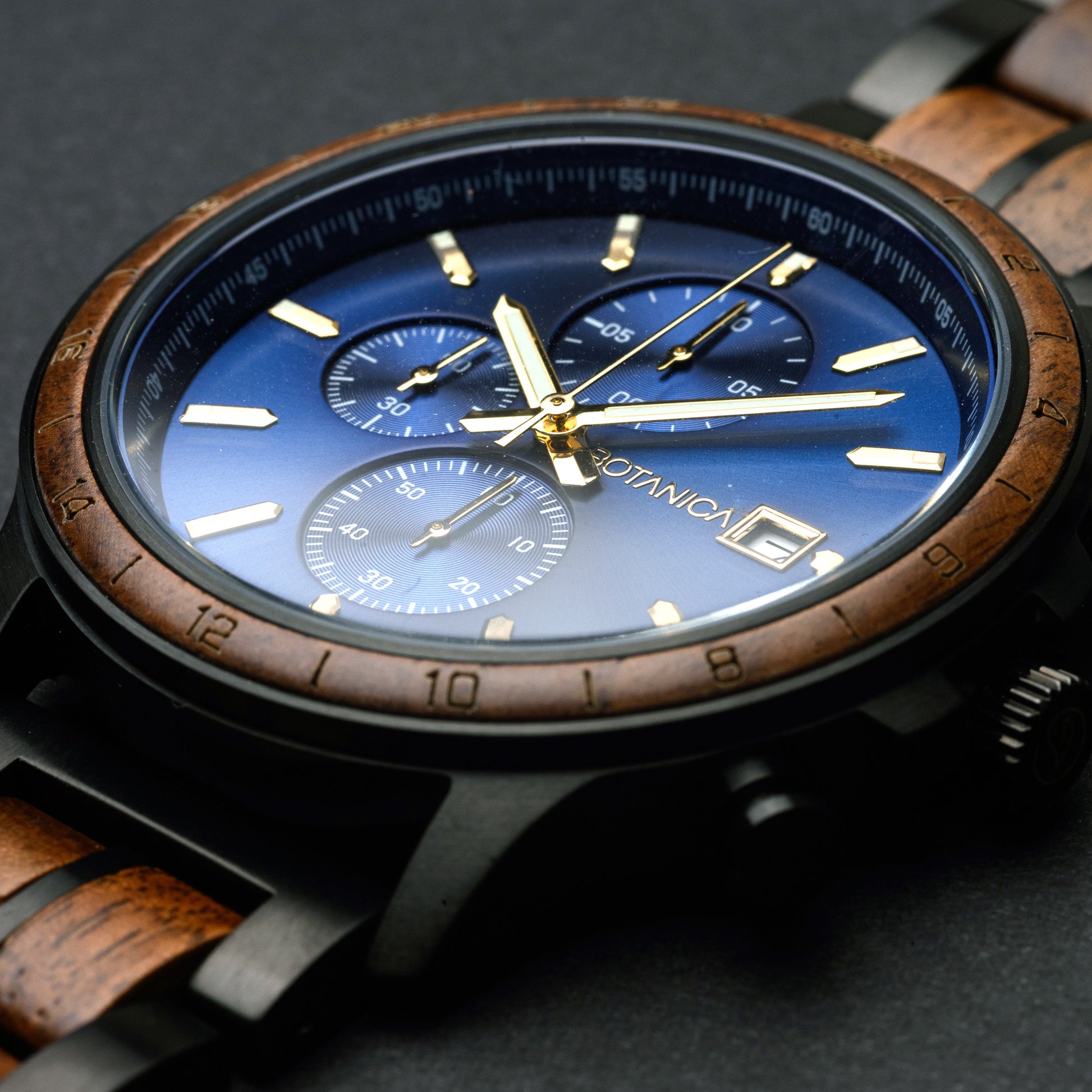 Wood Watch with a wooden strap and blue dial on a dark background