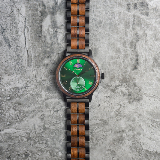 Wooden watch with a green face on a textured gray background